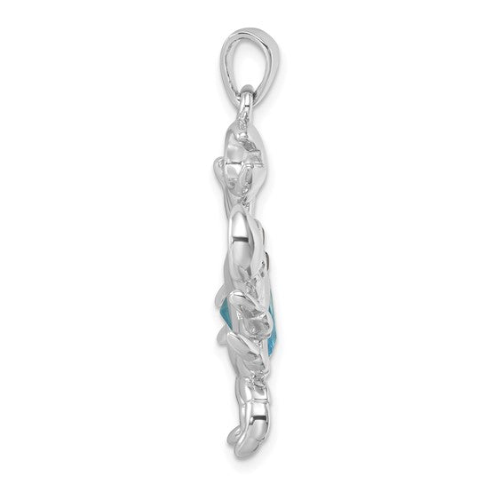 Side view of the Crystal Crab Pendant by Presco/Quality Gold, crafted in sterling silver with a looping bail and intricate twisted design, featuring a partially visible blue crystal at its center—a striking jewelry piece.
