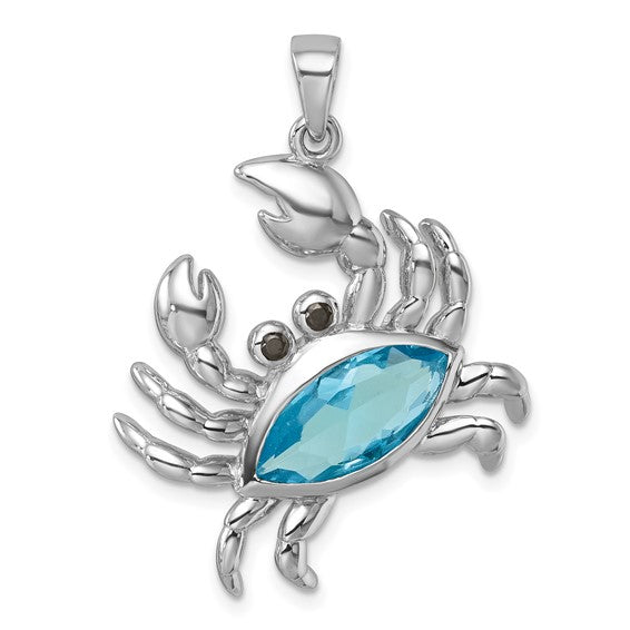 The Crystal Crab Pendant by Presco/Quality Gold is crafted in sterling silver, featuring a large oval blue gemstone body, two dark crystal eyes, and detailed legs and claws—a striking crystal jewelry piece perfect for any necklace.