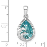 The Presco/Quality Gold Crystal Wave Tear Drop Pendant features a blue gemstone and sterling silver wave design, displayed on a grid with inch markings for size reference.