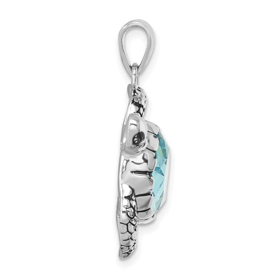 The Presco/Quality Gold Crystal Medium Turtle Pendant features a detailed turtle design with a faceted blue gemstone shell and silver loop—an elegant jewelry piece perfect for any collection.