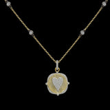 The Be-Je Designs Gold Clear Pave CZ Heart Charm Necklace features a square pendant with a raised, diamond-lined heart on brushed 14kt gold. This adjustable necklace is elegantly shown against a black background.