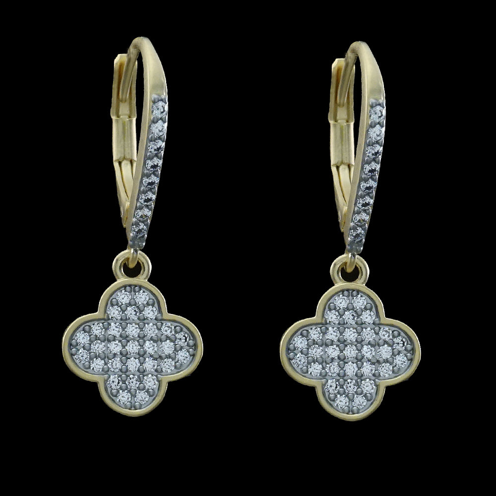 Be-Je Designs Gold/Silver CZ Pave Clover Dangle Leverback Earrings feature four-leaf clover pendants with sparkling cubic zirconia and gemstone-accented hooks, set against a sleek black background.