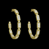 The Be-Je Designs Gold CZ Rectangles Hoop Earrings feature a modern gold design with sparkling cubic zirconia, perfect for any occasion.
