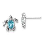 Presco/Quality Gold Swarovski Crystals Turtle/Aquamarine Stud Earrings: sterling silver turtle-shaped studs with aquamarine centers as shells. One faces forward, the other from the side, showcasing these charming, sparkling earrings.