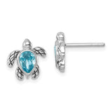 Presco/Quality Gold Swarovski Crystals Turtle/Aquamarine Stud Earrings: sterling silver turtle-shaped studs with aquamarine centers as shells. One faces forward, the other from the side, showcasing these charming, sparkling earrings.