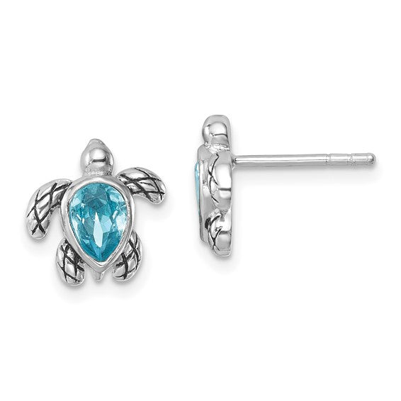 Presco/Quality Gold Swarovski Crystals Turtle/Aquamarine Stud Earrings: sterling silver turtle-shaped studs with aquamarine centers as shells. One faces forward, the other from the side, showcasing these charming, sparkling earrings.