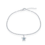 The Classic of New York Larimar Turtle Dangle Anklet features a sterling silver chain, blue Caribbean gemstone accents, a turtle charm, and is secured with a lobster clasp plus adjustable extender.