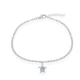 The Classic of New York Larimar Turtle Dangle Anklet features a sterling silver chain, blue Caribbean gemstone accents, a turtle charm, and is secured with a lobster clasp plus adjustable extender.