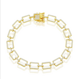 The Classic of New York Gold Plated CZ Square Paperclip Bracelet, featuring diamond-encrusted square links and a decorative clasp, is showcased against a white background.