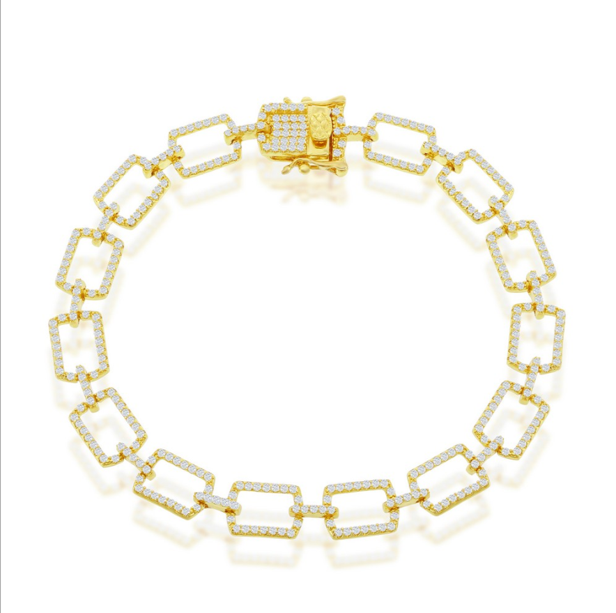 The Classic of New York Gold Plated CZ Square Paperclip Bracelet, featuring diamond-encrusted square links and a decorative clasp, is showcased against a white background.