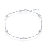 The Sterling Silver Turtle Anklet by Classic of New York features small turtle-shaped links on a thin 925 sterling silver chain with an adjustable clasp.