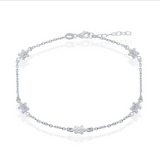 The Sterling Silver Turtle Anklet by Classic of New York features small turtle-shaped links on a thin 925 sterling silver chain with an adjustable clasp.