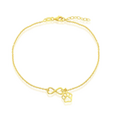 The Classic of New York Gold Plated Infinity & Paw Print Anklet features gold infinity and paw print charms, plus an adjustable clasp with extension chain.