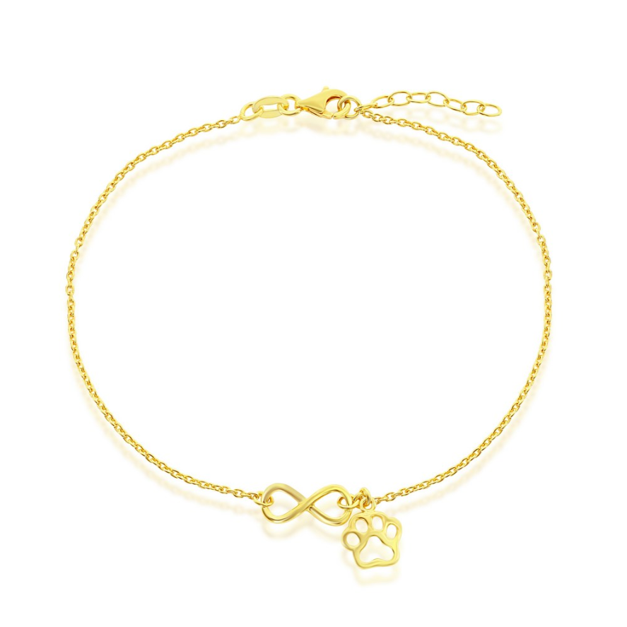 The Classic of New York Gold Plated Infinity & Paw Print Anklet features gold infinity and paw print charms, plus an adjustable clasp with extension chain.
