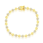 The Gold Plated Polished/Micro Pave CZ Hearts Bracelet by Classic of New York showcases alternating solid and CZ-studded heart links in a circular design, complete with a secure clasp.