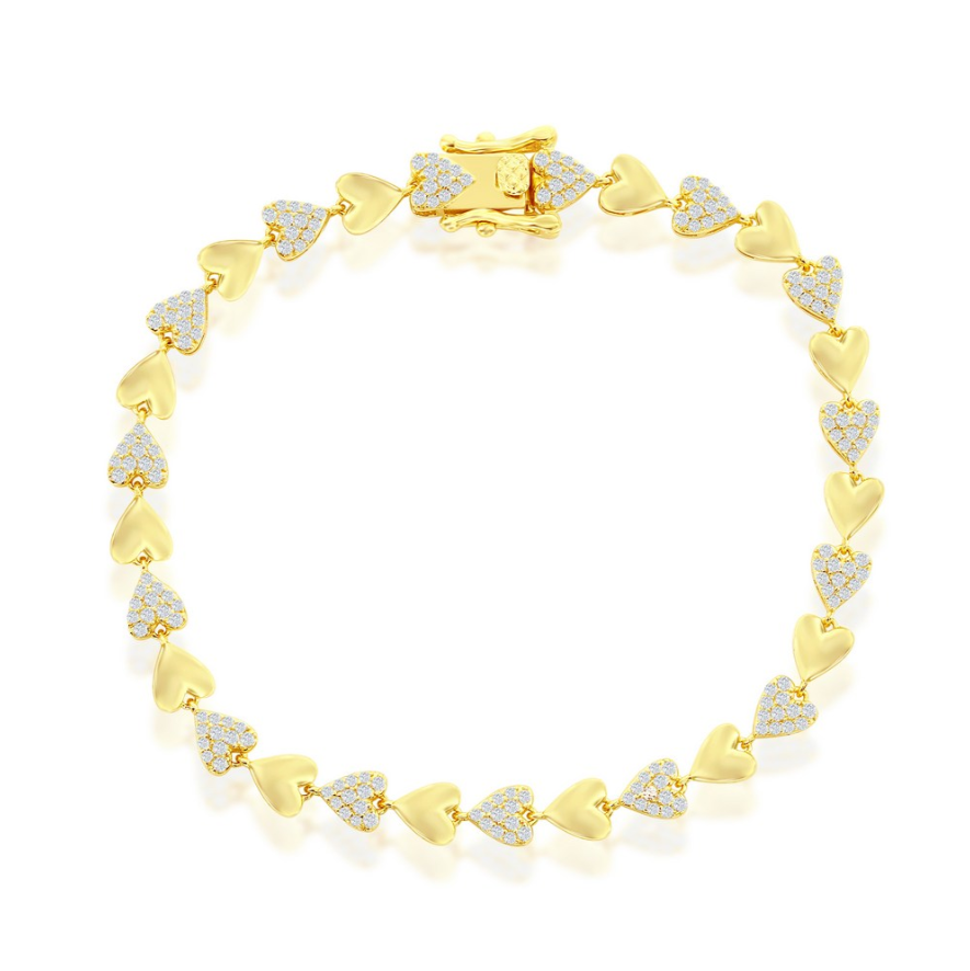 The Gold Plated Polished/Micro Pave CZ Hearts Bracelet by Classic of New York showcases alternating solid and CZ-studded heart links in a circular design, complete with a secure clasp.