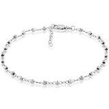 The Classic of New York Sterling Silver Diamond Cut Anklet features a delicate 925 sterling silver chain with diamond-cut beads and an adjustable lobster clasp extender.