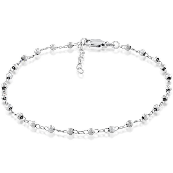 The Classic of New York Sterling Silver Diamond Cut Anklet features a delicate 925 sterling silver chain with diamond-cut beads and an adjustable lobster clasp extender.