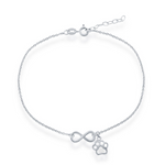 The Sterling Silver Infinity & Paw Print Anklet by Classic of New York features an adjustable chain, lobster clasp, and delicate charms—a central infinity symbol and a small paw print.