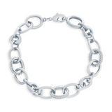 The Classic of New York Sterling Silver Micro Pave CZ & Polished Oval Bracelet features large oval links, some embellished with micro pave CZ stones, and is secured with a lobster clasp.