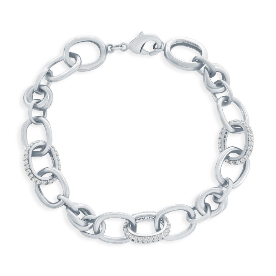 The Classic of New York Sterling Silver Micro Pave CZ & Polished Oval Bracelet features large oval links, some embellished with micro pave CZ stones, and is secured with a lobster clasp.