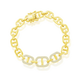 The Gold Plated Silver Micro Pace CZ Linked Bracelet by Classic of New York features rectangular links, three larger links with sparkling white stones, a secure clasp, and is crafted from 925 sterling silver.