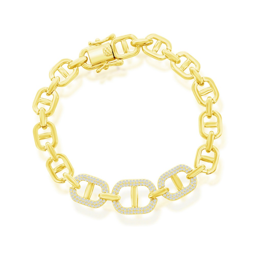 The Gold Plated Silver Micro Pace CZ Linked Bracelet by Classic of New York features rectangular links, three larger links with sparkling white stones, a secure clasp, and is crafted from 925 sterling silver.