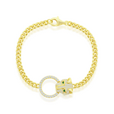 The Classic of New York Gold Plated Panther Emerald CZ Eyes Bracelet features a 925 sterling silver panther head with emerald CZ eyes and clear gems holding a circular ring, shown on a white background.