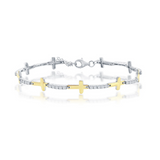 The Gold Plated CZ Sideways Cross Bracelet by Classic of New York features alternating yellow gold plated and sterling silver cross links, sparkling white stones, and a secure lobster clasp.