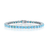 The Classic of New York Larimar 5MM Tennis Bracelet features a single row of round larimar stones set in prongs on rhodium plated 925 sterling silver, displayed on a white background.