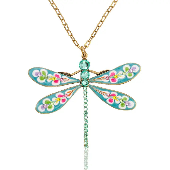 The Brite Burst Floral Bouquet Large Dragonfly Crystal Necklace by Anne Koplik Designs, Inc. features vibrant enamel wings, colorful floral accents, and green crystals for a bold boho statement.