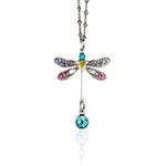 The Anne Koplik Designs, Inc. Multi Stone Dragonfly w/Drop Necklace features silver plating, colorful gemstones on the wings and body, and a dangling blue gem at the tail—a vibrant crystal piece for any jewelry collection.