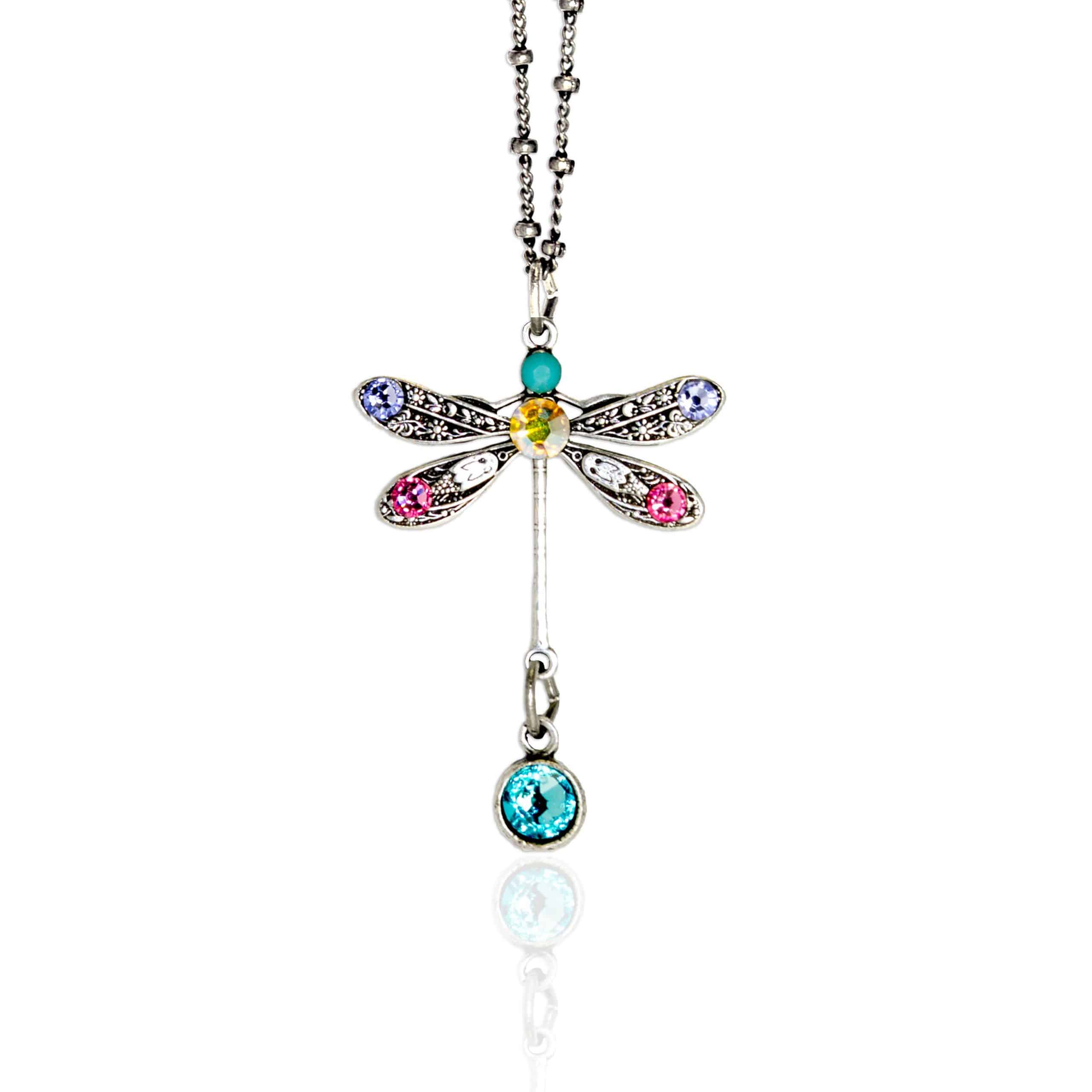 The Anne Koplik Designs, Inc. Multi Stone Dragonfly w/Drop Necklace features silver plating, colorful gemstones on the wings and body, and a dangling blue gem at the tail—a vibrant crystal piece for any jewelry collection.