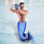 A bearded merman with a blue scaly tail holds a globe on his shoulder, smiling. A peace sign tattoo on his arm exudes tranquility in light blue waters. This enchanting scene inspires the Axis Ornament from December Diamonds, perfect for adding holiday magic to your decor.