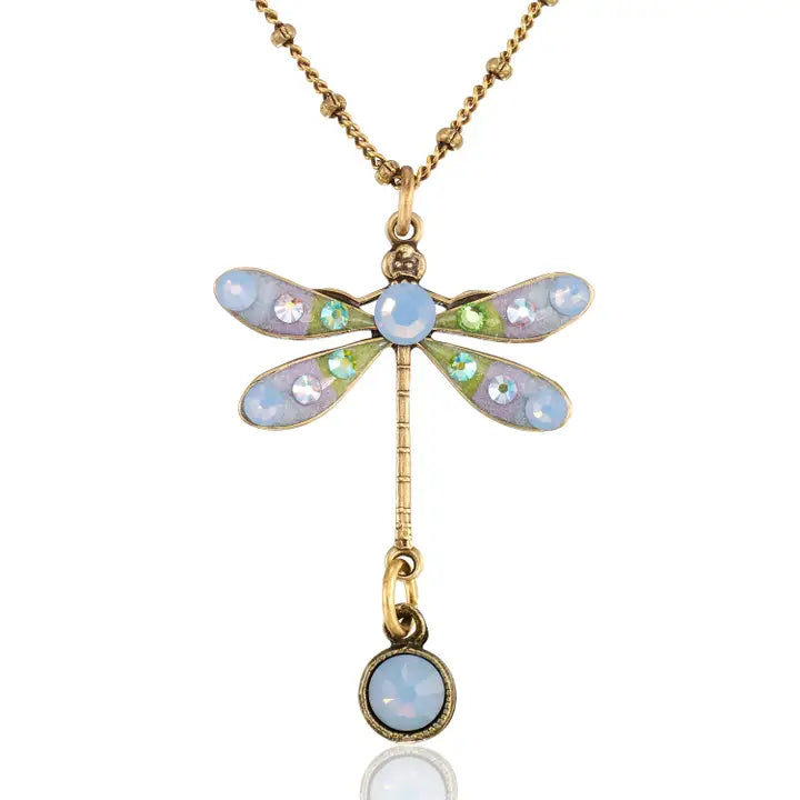 The Light Blue Pastel Dream Dragonfly Crystal Drop Necklace by Anne Koplik Designs, Inc. features pastel blue and green gemstones on the wings and a round blue gem drop from the tail, making it a stunning vintage-inspired designer piece.