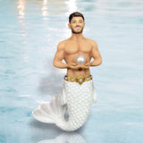 The December Diamonds June Birthstone-Pearl Merman features a smiling merman with a human torso, white fish tail, ornate gold belt, and large pearl—June’s birthstone—held in both hands as he stands in water.