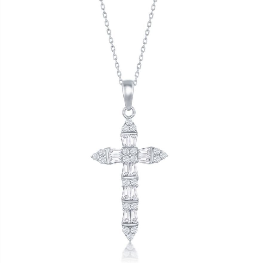 The Classic of New York Sterling Silver Baguette CZ Cross Necklace features a sparkling baguette CZ cross pendant on a delicate 925 sterling silver, rhodium-plated chain, displayed against a white background.