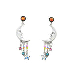 Handmade in Guatemala, the Luna Quarter Moon Multi-Color Earrings by Firefly feature silver crescent moons with face details, orange studs, colorful stars, beads, and chain dangles for a whimsical celestial fair-trade jewelry design.