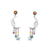 Handmade in Guatemala, the Luna Quarter Moon Multi-Color Earrings by Firefly feature silver crescent moons with face details, orange studs, colorful stars, beads, and chain dangles for a whimsical celestial fair-trade jewelry design.