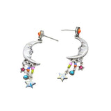 Luna Quarter Moon Multi-Color Earrings by Firefly Jewelry: Silver crescent moon earrings featuring smiling faces, colorful beads, and dangling star charms. Handmade in Guatemala, these earrings showcase the essence of fair-trade craftsmanship.