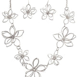 The A-Train Silver 3D Flowers Necklace Set features multiple wire-formed openwork blooms linked together, crafted from mixed jeweler’s metals for a lightweight and elegant floral look.