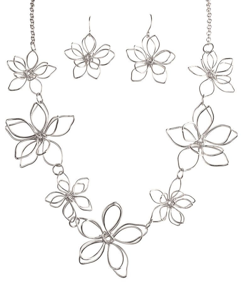 The A-Train Silver 3D Flowers Necklace Set features multiple wire-formed openwork blooms linked together, crafted from mixed jeweler’s metals for a lightweight and elegant floral look.