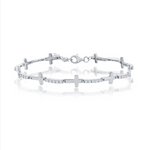 The Classic of New York Sterling Silver & CZ Sideways Cross Bracelet features multiple cross links with sparkling stones and a lobster clasp, shown on a white background.