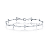 The Classic of New York Sterling Silver & CZ Sideways Cross Bracelet features multiple cross links with sparkling stones and a lobster clasp, shown on a white background.