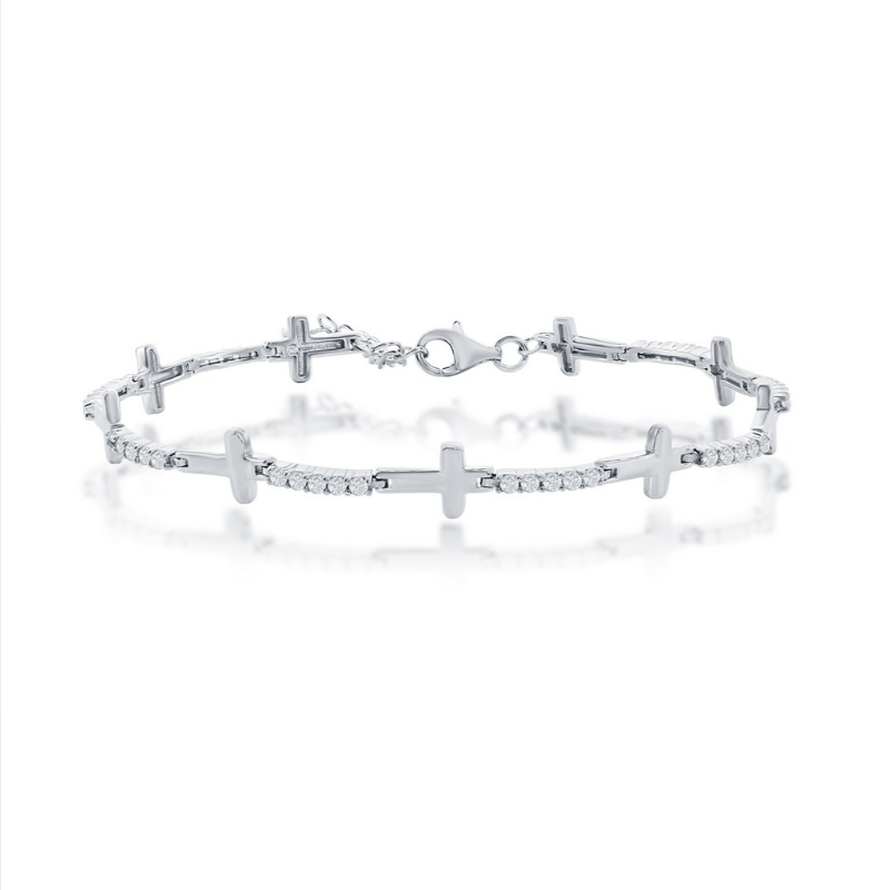 The Classic of New York Sterling Silver & CZ Sideways Cross Bracelet features multiple cross links with sparkling stones and a lobster clasp, shown on a white background.