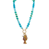 A-Train Gold Blue Mix Beads Fish Charms Necklace Only: Showcasing vibrant blue beads, a dangling gold fish charm, and a delicate white pearl accent, this necklace is beautifully displayed on a white background—making it the perfect statement piece for any stylish ensemble.