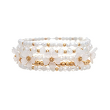 A-Train’s Gold White Flower Beads Five Piece Bracelet Set showcases stacked beaded bracelets adorned with clear and gold white flower beads and delicate white flower charms—an elegant jewelry set perfect for any occasion.