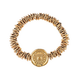 A-Train’s Gold Disc Beads Sunflower Medallion Bracelet features gold-toned, stacked circular beads and a central round charm with a sunburst motif, forming a seamless loop for an elegant accent suitable for any occasion.
