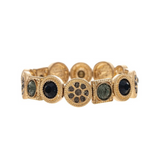 The A-Train Gold Black Dark Blue Gems Mixed Discs Bracelet features alternating round and square segments, each set with dark blue gems and finished with intricate detailing.