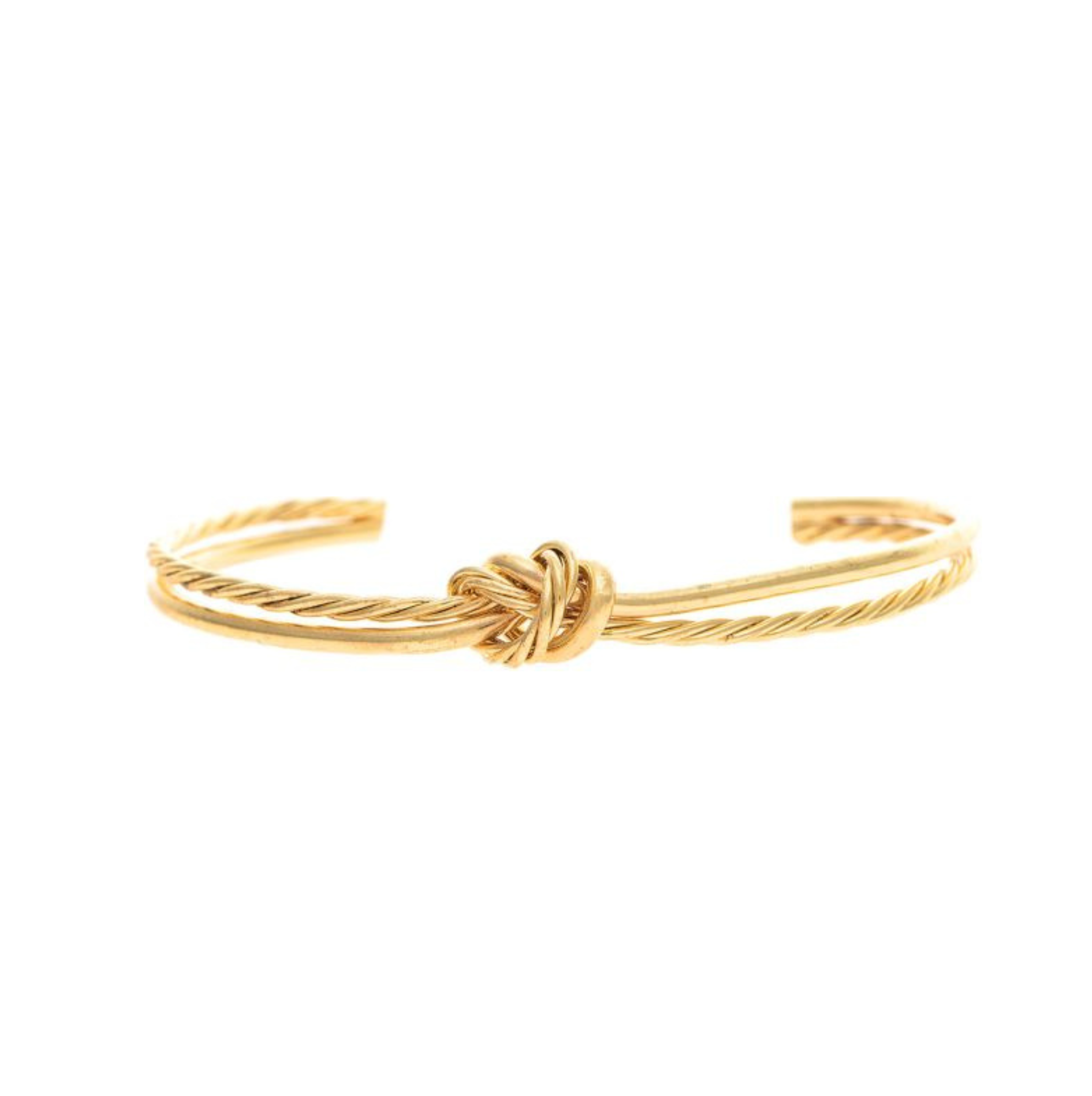 A-Train's Gold Twisted Pretzel Narrow Bracelet showcases a twisted rope design with a central knot detail, and features an open-ended, adjustable style for easy wearing.